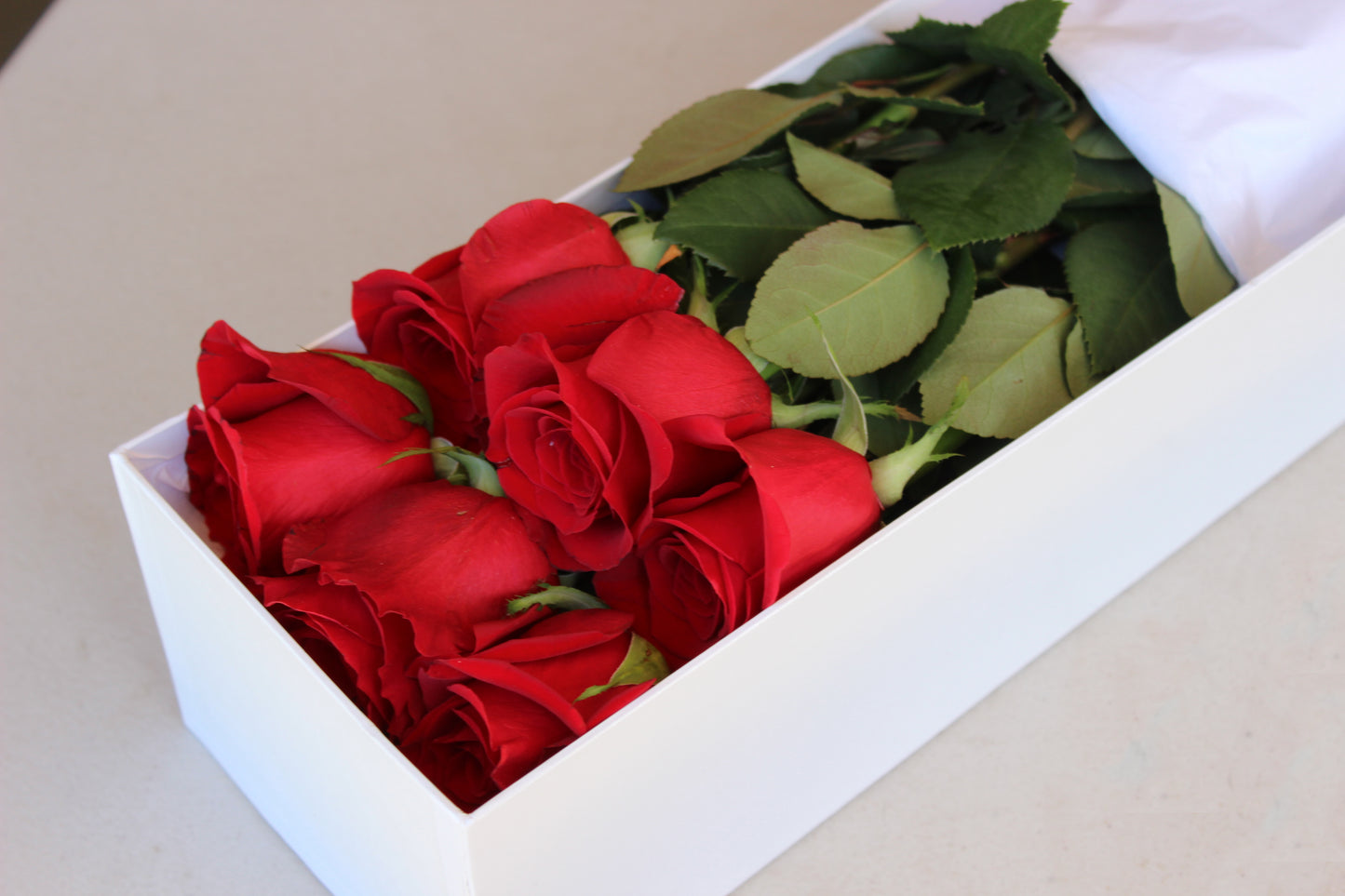 Long stemmed Ecuador roses in a box